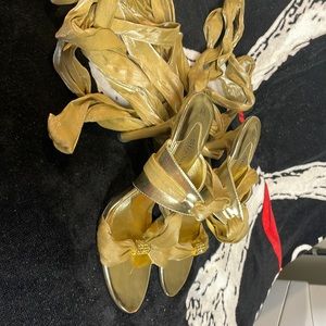 Gold ribbon lace up shoes